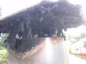 Creosote clogged chimney cap in Spokane